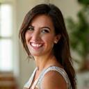 Portrait of Sarah Mendoza, a kind-faced woman creating a calming ambiance.