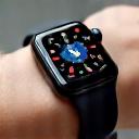 Close-up of an Apple Watch demonstrating health metrics on a vibrant display.